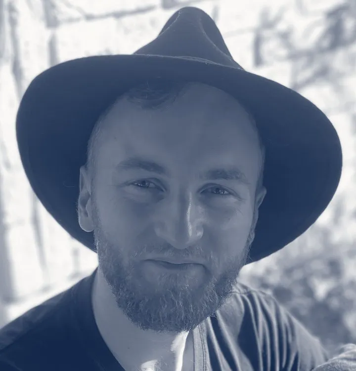 Oli Nelson, founder of NelsonWorks, in a black felt hat